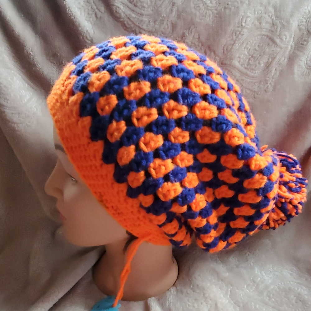 Crocheted slouchy beanie hat with pom pom